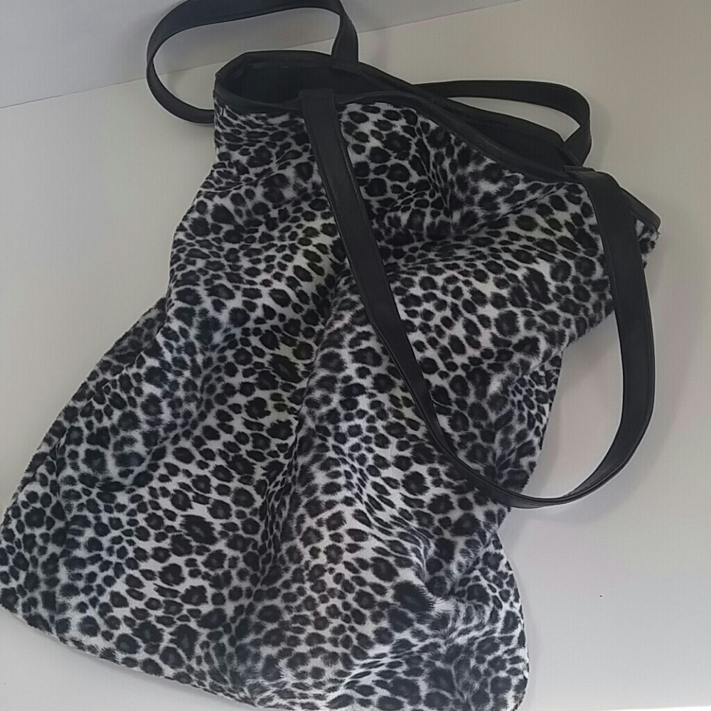 Soft cheetah print black and white bag